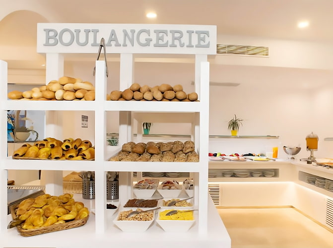 Desayuno Buffet Sección de panes y bollería del Buffet Libre de desayuno